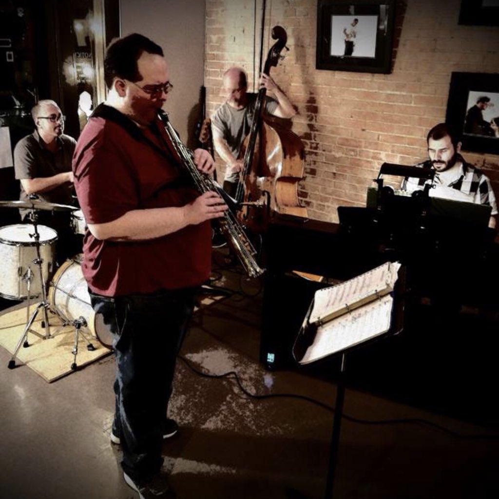 KNTU881's tweet photo. The Bobby Falk Group performed Thursday, May 31, at Steve's Wine Bar on Hickory, east of the historic downtown Denton Square. Falk at the drumset, Aaron Irwinsky with soprano and tenor sax work, Jeffry Eckels on bass, and Peter Rioux on piano. https://t.co/x6VInMpoKn