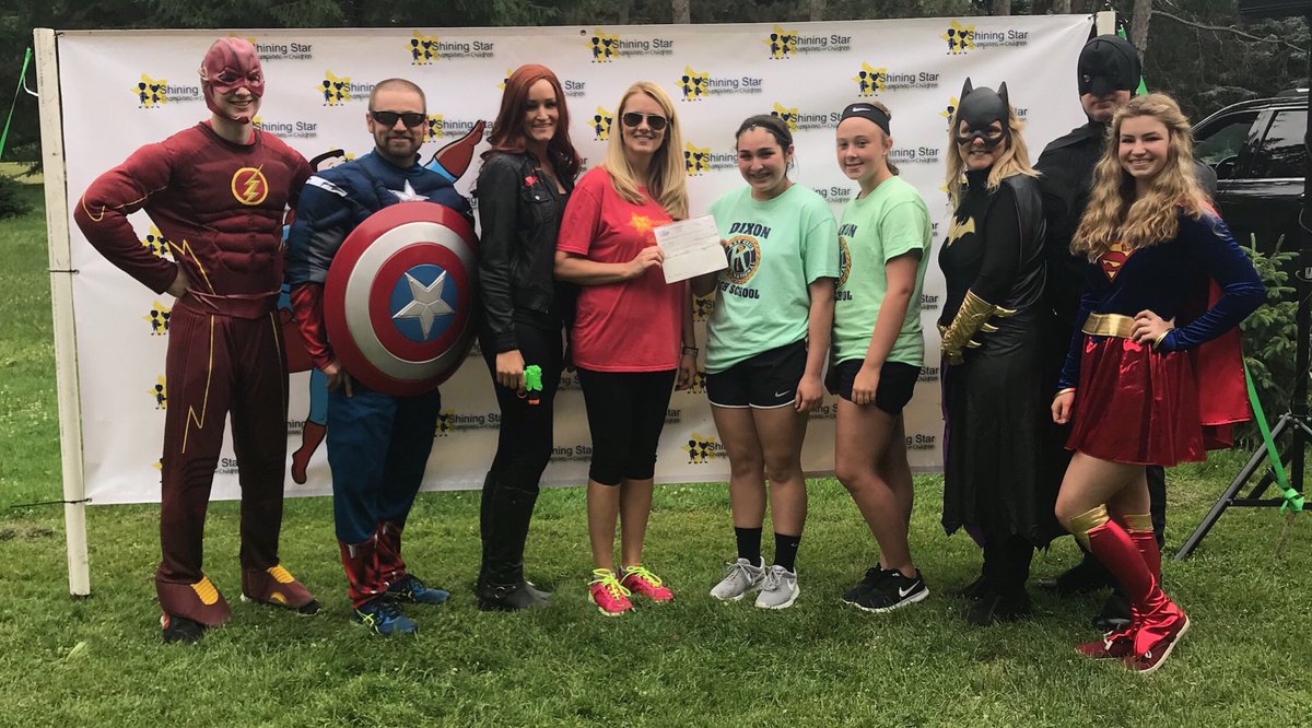 dixonkeyclub's tweet photo. Kaitlynn and Emily present a $250 donation from Dixon Key Club to the Shining Star Children’s Advocacy Center at the Champions for Children’s Walk this morning. #keyclublife #notallheroeswearcapes https://t.co/vrTiTYWo2l