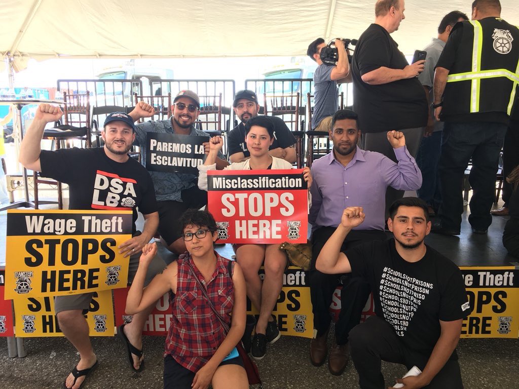 MsEddieD's tweet photo. Solidarity with port truck drivers fighting #wagetheft and labor exploitation. Great to have the support of @SenSanders here to stand for working people #OurPeopleOurPort #LivingWage #CALovesBernie #PredatoryCapitalism https://t.co/X8zeAdRltW https://t.co/raukgm9z4E