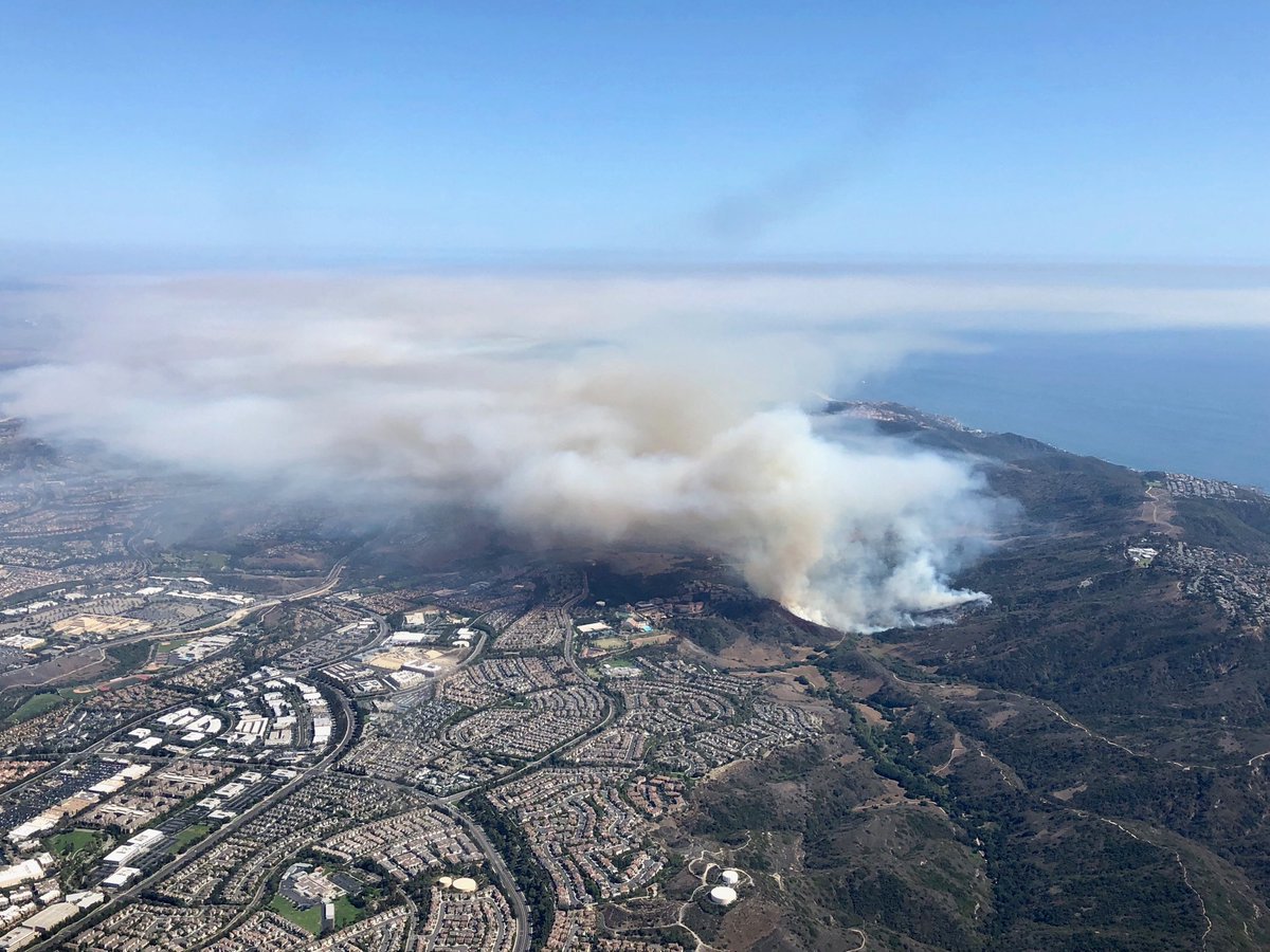 KevinTakumi's tweet photo. Aliso Fire @OCFA getting a handle with helo/fixed wing drops 75+ acres. Winds dying down. 0% containment https://t.co/3O9u0USIDv