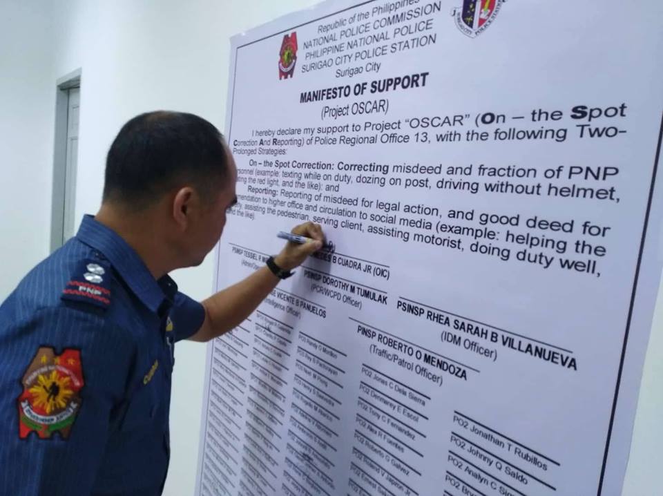 SCPS_PCR's tweet photo. Surigao City PS personnel led PSUPT DIOMEDES B CUADRA JR, OIC, conducted signing of manifesto re launching of Project “OSCAR” (On the Spot Correction and Reporting). https://t.co/GyYWoEVTCp