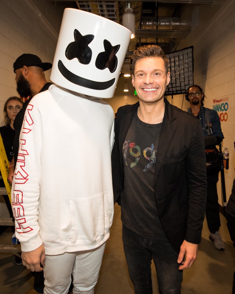 marshmello's tweet photo. Who has a better smile? Me or @RyanSeacrest https://t.co/HrmE8kFyTN
