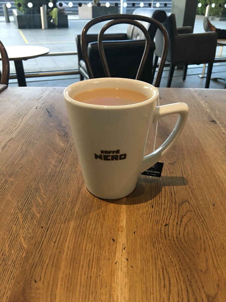 CK_Brownlee's tweet photo. Obligatory #AirportBeer doesnโt feel too fitting on a work trip... #teaitis #heathrow โ๏ธ https://t.co/K1X0Swt35H