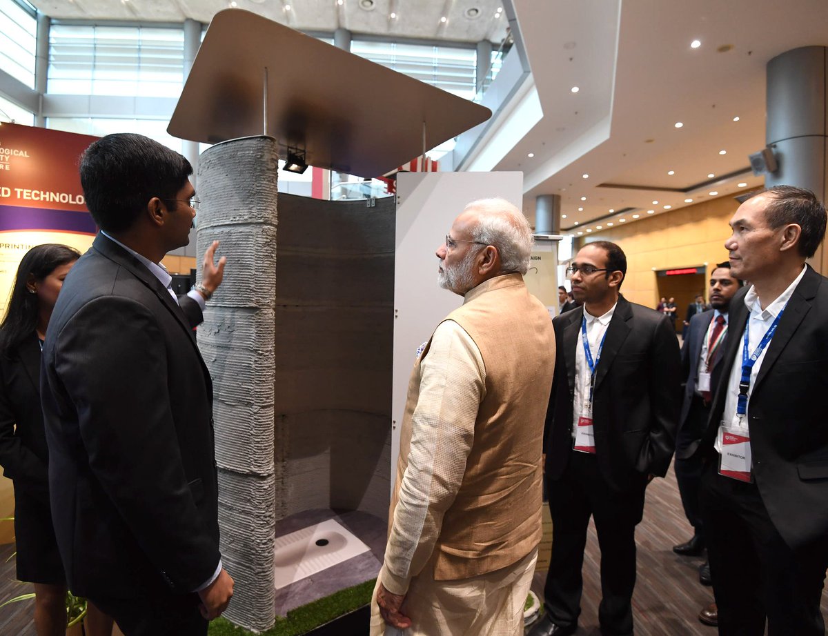 nisar26's tweet photo. Presenting our research and idea to the Indian PM @narendramodi, For 3D Printing of Toilets for the Swachh Bharat Campaign! @swachhbharat #3DConcretePrinting #MODISG2018 #3DPrinting #GreenConcrete #EcoConcrete #FlyashConcrete #NTUsg #SC3DP #SwachhBharat https://t.co/UzukBIviT4 https://t.co/xFYpd89wl7