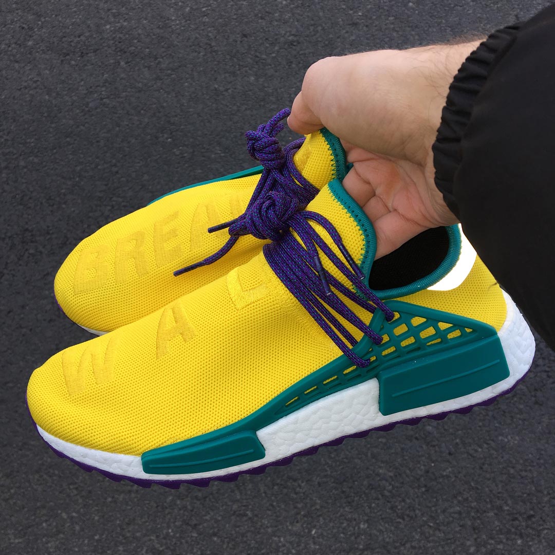 thesolesupplier's tweet photo. The Pharrell Williams x adidas Originals NMD Hu ‘Lemon’ is the ultimate summer shoe 🍋

https://t.co/XxTSH72mdw https://t.co/UKZQOOA0c9