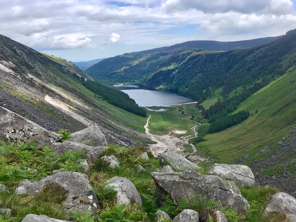 GlacialErosion's tweet photo. I think the heat got to @NoIcyNoLikey today... thinks he’s out hunting for Irish mammoths. More rocks, more slope failures and the 260th boulder sample in #glendalough #NeolithicMan #HunterGatherer #HeatStroke https://t.co/nXwt95AJpf