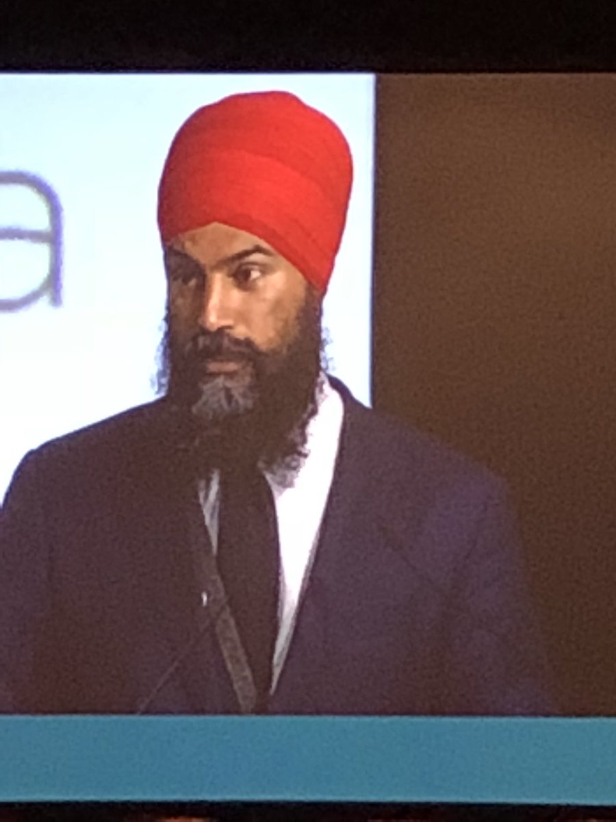 Iwanchuk's tweet photo. All four federal party leaders addressed the delegates at #FCM2018. We need to stop the offloading onto municipalities from other levels of government. #yxecc https://t.co/b9rtVvR4bO