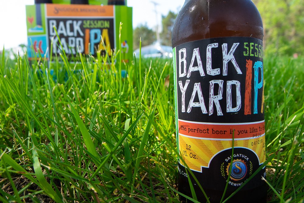 saugatuckbrew's tweet photo. Green grass, shade and some Session IPA. Do more (of less) this Sunday with Backyard IPA. #HeresToHappy #BackyardIPA #LazySunday #MIbeer https://t.co/uw2veIliXM