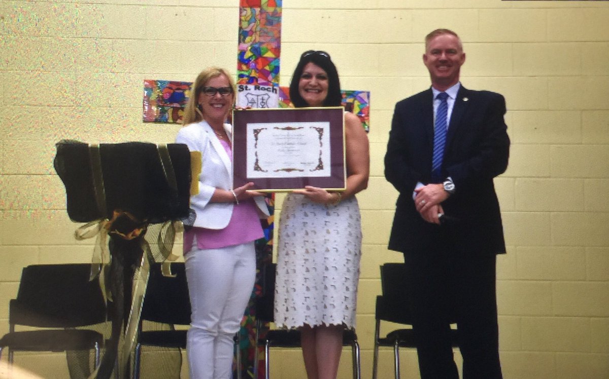 TCDSB's tweet photo. @TCDSBdirector and Superintendent @floracifelli present @StRochCS principal with a certificate on behalf of the Board in celebration of the school’s 50th Anniversary https://t.co/tscZjEYLCG