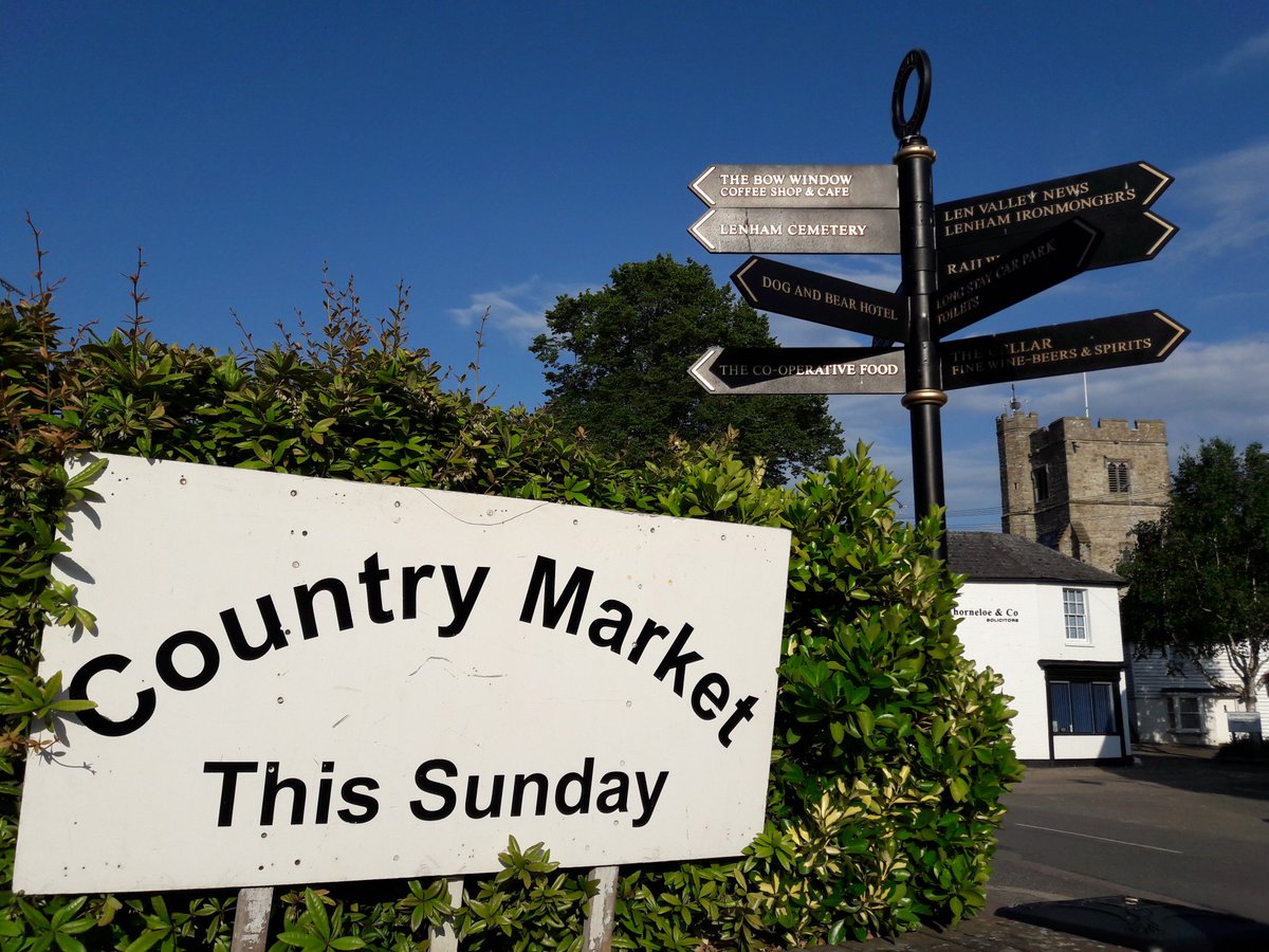 blue skies over #lenham tonight as we put up the signs for next sundays market. road works start in the village this week.