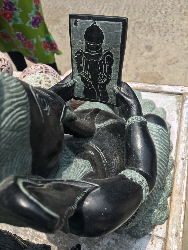 OsamaManzar's tweet photo. And here is a Ganesha with Tablet taking Selfie. Found at a stone carving shop at Mahabalipuram. The shopkeeper proudly says that “with changing times, our gods also change their habits.” https://t.co/JyCfb1DjMr