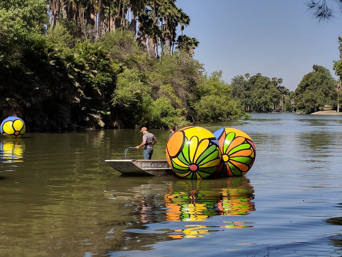 Rivartalliance's tweet photo. De-Launching crew has been hard-at-it the last 2 days but all 350 spheres are out. Many hands make light work? #artfloat #artfloatriverside #artallianceofriversideartmuseum https://t.co/4MEapoOWN3