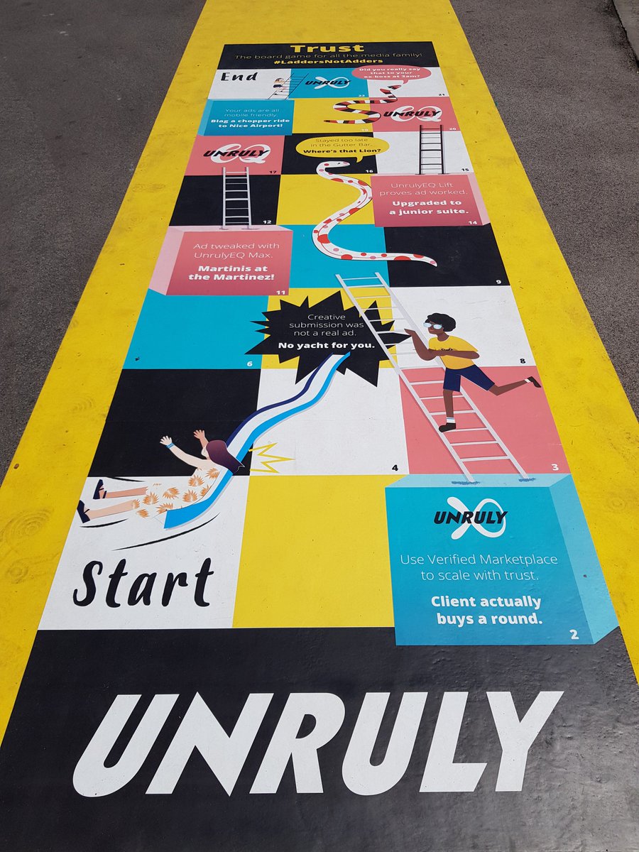 unrulyco's tweet photo. Let us know if you spot our #Trust The Boardgame carpet adding a splash of colour to La Croisette! #CannesLions #LaddersNotAdders https://t.co/PqZrHYbW4e