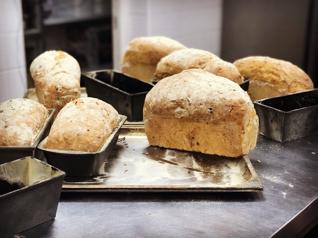 LoveYourselfHQ's tweet photo. It’s a must that our chef’s bake from scratch. This is our delicious artisan gluten free, soft &amp; crispy sourdough bread ready for tomorrow’s breakfast. Everything from scratch #sourdough #bread #glutenfree #mealplans #delivereddaily #artisan https://t.co/Y1rbW8V5cF