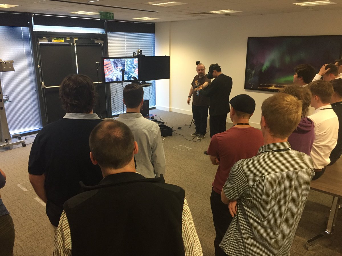 SatAppsCatapult's tweet photo. The #SPIN18 interns are discovering a range of tech used in the #space sector, including #VR, gaming #tech, and a visit to @RAL_Space_STFC. Here they’re with our #apps team demoing our #mining VR application! https://t.co/9I4cjmxDoT