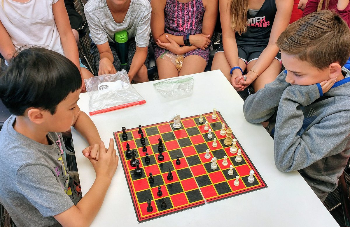 KrisFerguson17's tweet photo. NPE 5th grade #chessclub Champion met some stiff competition today. You could almost see steam coming out their ears there was so much brain power being used. Shout out to all the other 5th graders watching the match #youcouldhearapindrop @dziegler15 @lafave_ @Colleen_CK https://t.co/VGc7fc4QpX