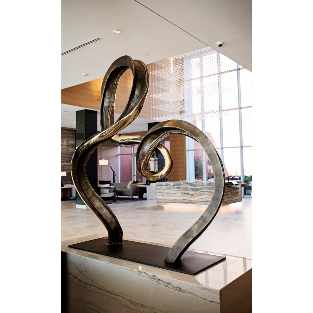 Art x AC
"Decisions" by Brad Oldham
The curvature of this bronze sculpture represents the indirect path Oklahoma City took to reach it's current state of vibrance.
