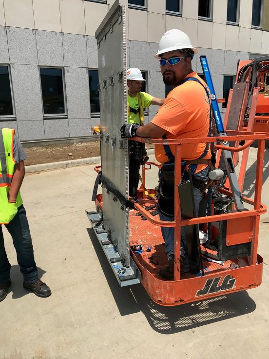 StonePanelsIntl's tweet photo. How fast can StoneLite® panels be installed?  SPI is installing our StoneLite® panels on the multi-story exterior façade of First State Bank HQs. We are currently installing at a rate of 2,900 sf per week and have the potential to be finished one month ahead of schedule. https://t.co/9MX0LD9qeD