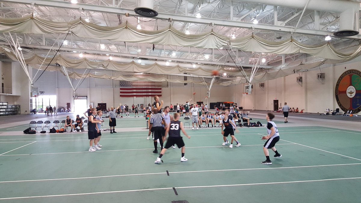 TobiVanscoy's tweet photo. Graham high school boys playing at the Ohio Northern Shootout today. #GrahamTOUGH⚫🏀⚪ #falconpride https://t.co/cemyTYsPAL