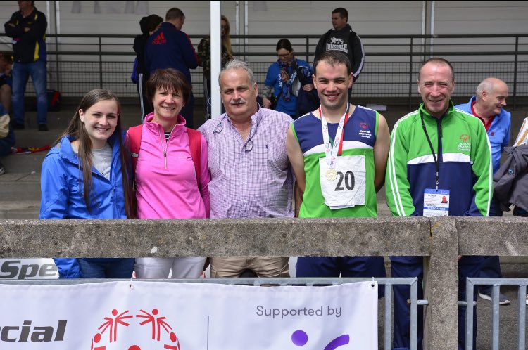 SOI_Aoife's tweet photo. Athlete Cain Moore from @SOConnaught with his 200m run gold medal, alongside his parents Michael and Noreen, his sister Rebecca, coach Joe and an action shot! @SOIreland well done Cain! 🥇 #PlayYourPart #IrelandGames https://t.co/K7BxvDx94R