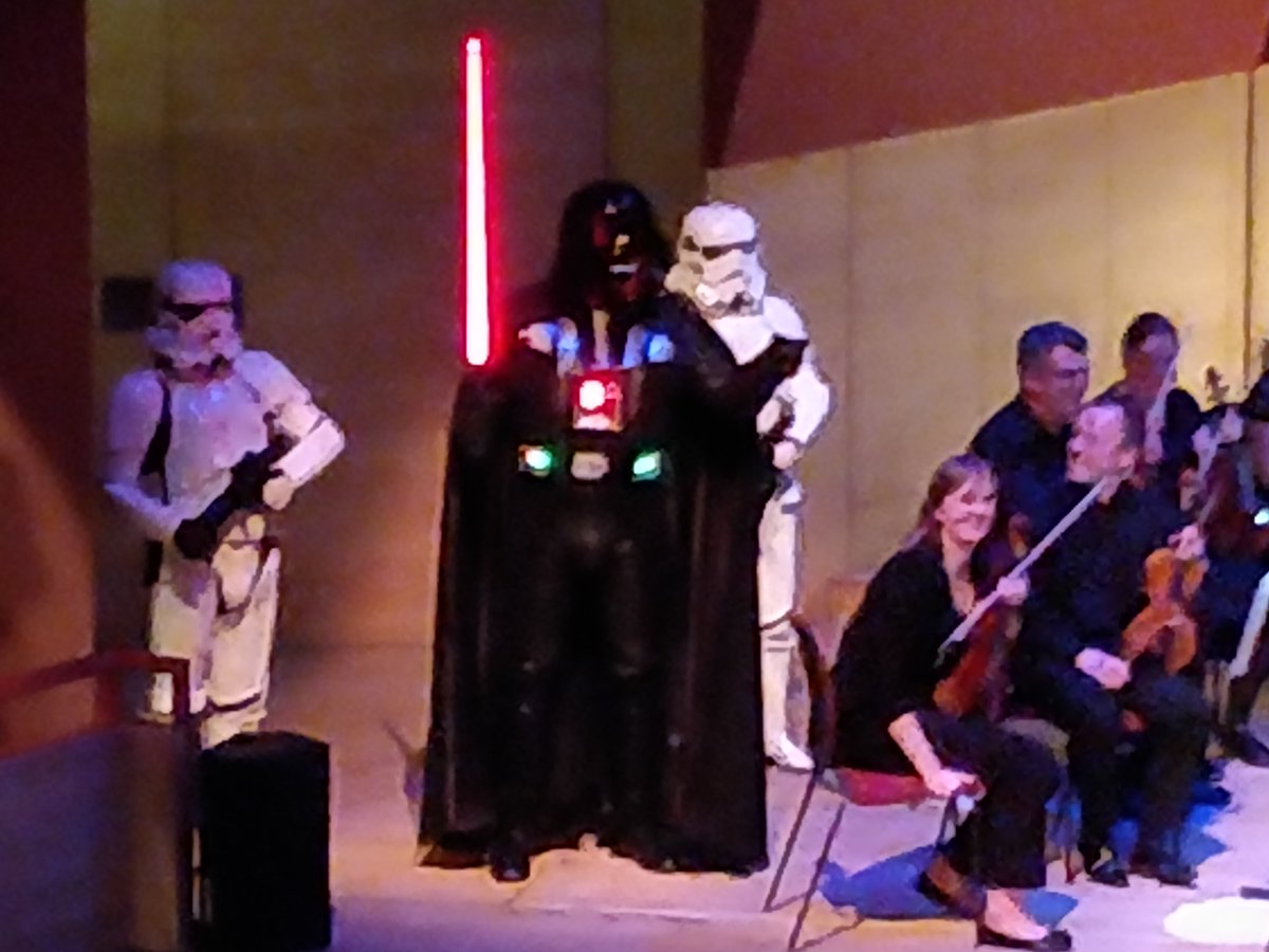nicevans20's tweet photo. @CinSymphony my daughter in the back row of violins fought off Darth Vader with her bow #BSO https://t.co/fmzHQHK6XE