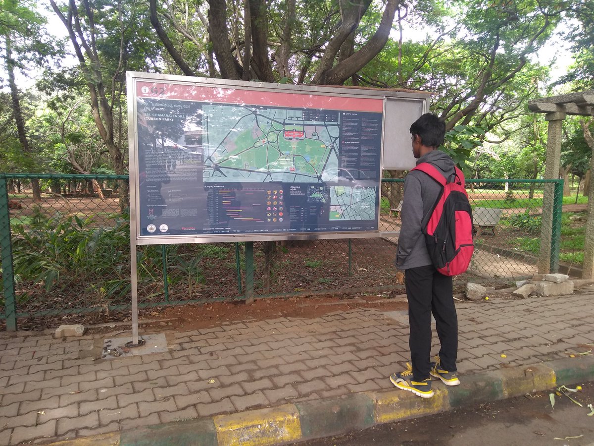 DeepithaM's tweet photo. A bloom cycle table, a list of experiential routes, a tit bit of history and lots of directions. yes! this signage in cubbon park has them all. #Cubbonpark #Bengaluru #SensingLocal https://t.co/KvNkXRTiZu