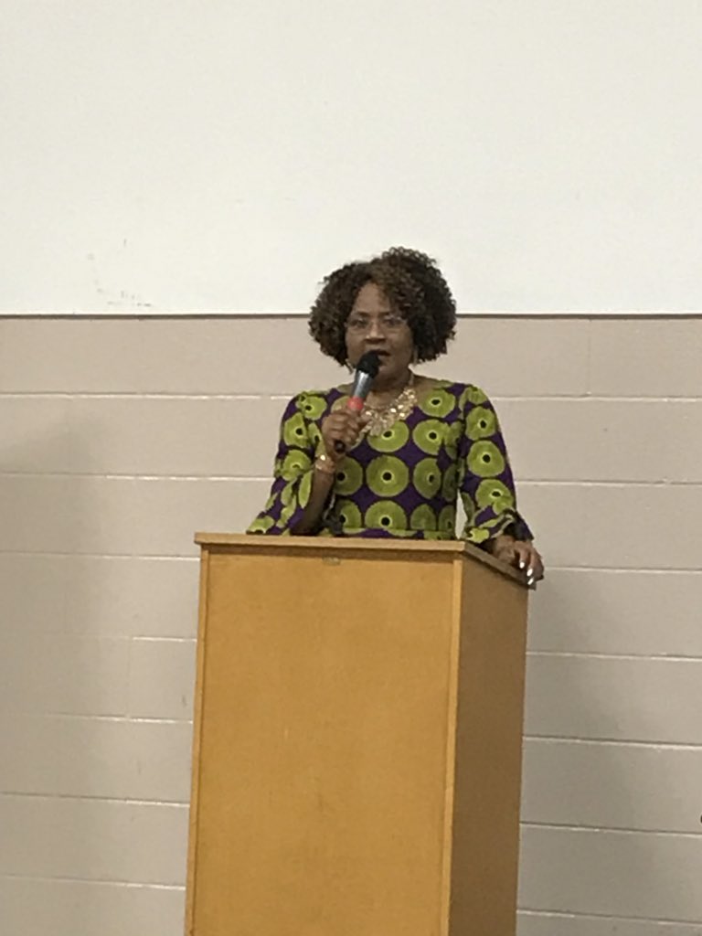 Liz Akano announces award recipients at the Congress of Black Women, Western Endowment Launch.