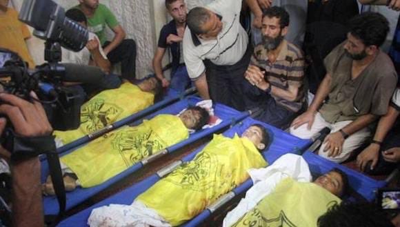Sergiosueldoo's tweet photo. INOCENCIA ROBADA ,ASESINAN A NIÑOS PALESTINOS LOS SOLDADOS SIONISTAS ISRAELÍES MATAN A NIÑOS PALESTINOS EN LA PLAYA SU ÚNICO DELITO ERA GUGAR AL FÚTBOL Y EL MUNDO Y LA PRENSA MIRA MIRAN HACIA OTRO LADO Y NO VEN EL DOLOR DEL PUEBLO PALESTINO YO QUIERO A PALESTINA 🇵🇸 LIBRE. https://t.co/lZzRCrvHZC