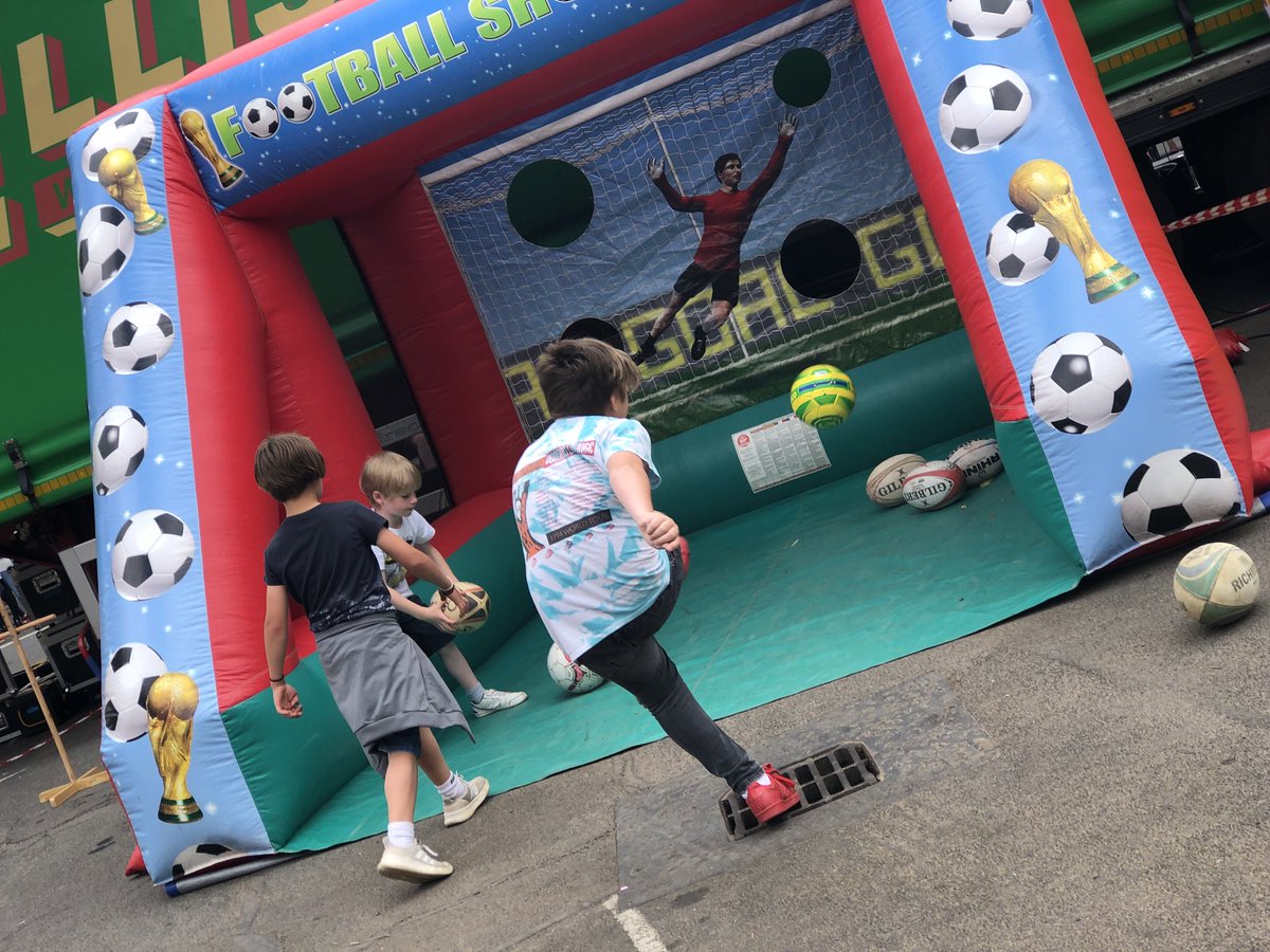 Lots for kids to do here at #Uppingham Feast ⚽️🏈⚽️