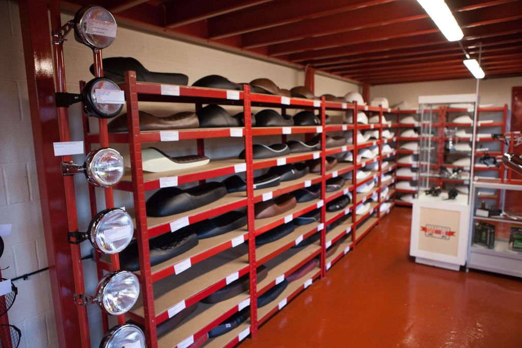 Shelves stacked high with Cafe Racer Seats! Want one? Go here > buff.ly/2kqKy0H we ship worldwide #caferacer #bratstyle #caferacerseats