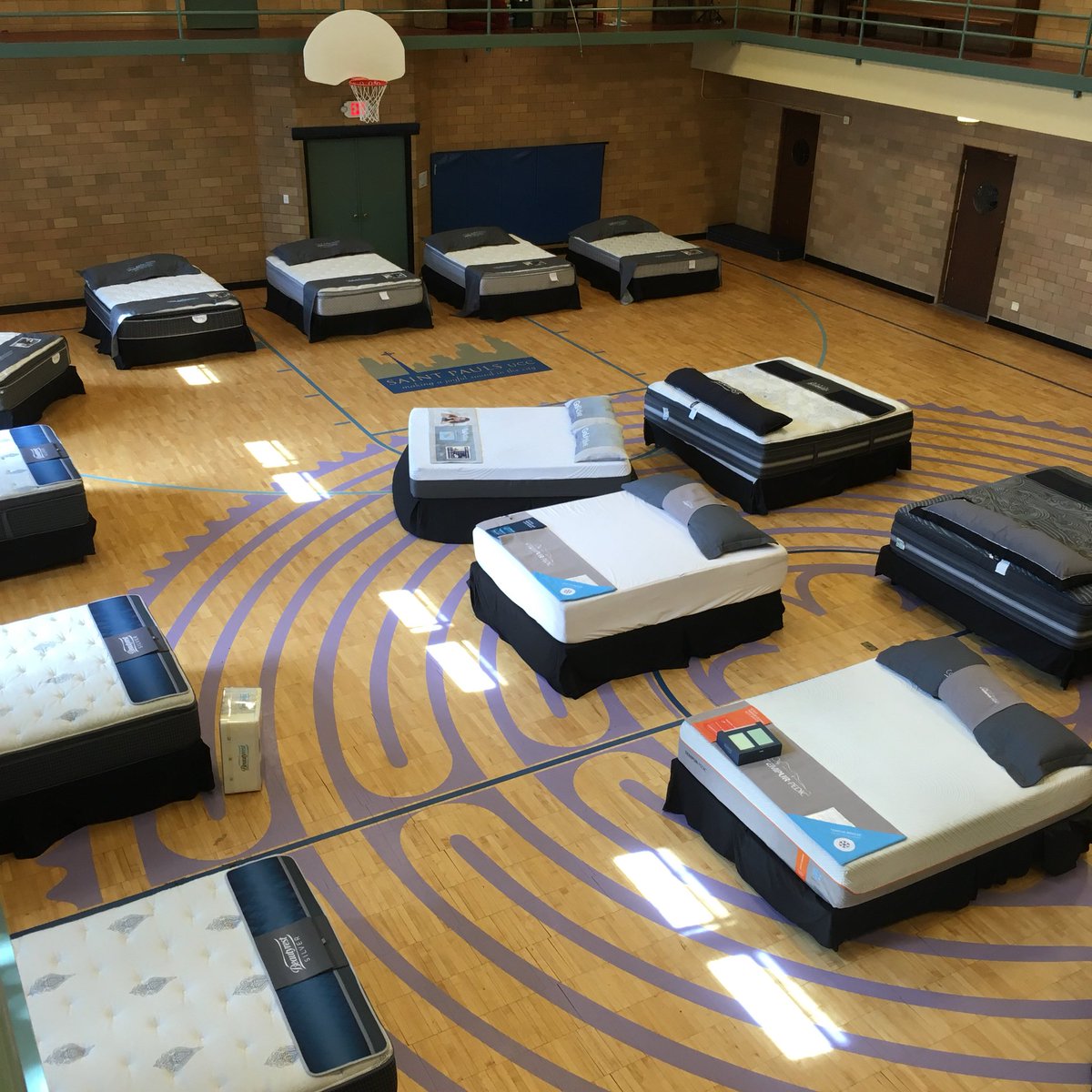 Mattress sale today in the gym benefits residents at <a href="/lpcschicago/">Lincoln Park Community Services</a>