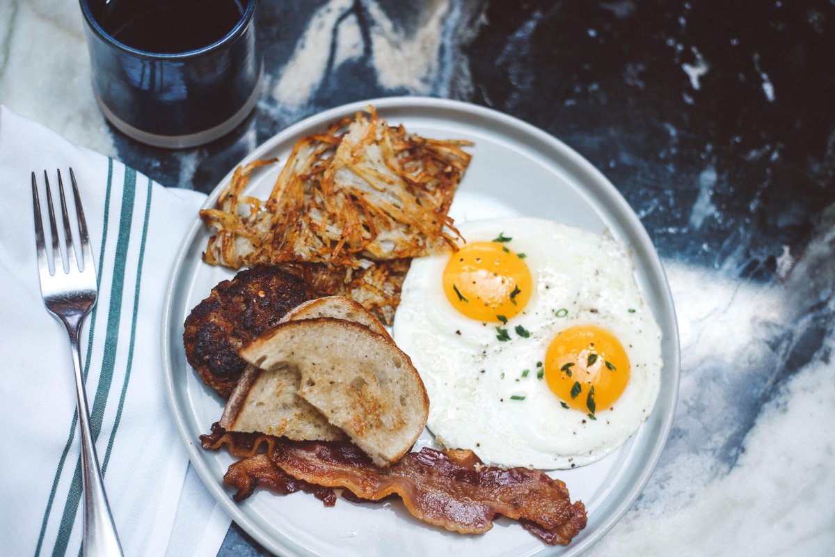 A classic: Eberly Breakfast with farm eggs, sausage or bacon, hash browns and sourdough toast. Available at all-day Sunday brunch from 9 a.m. to 5 p.m. #eberlyatx