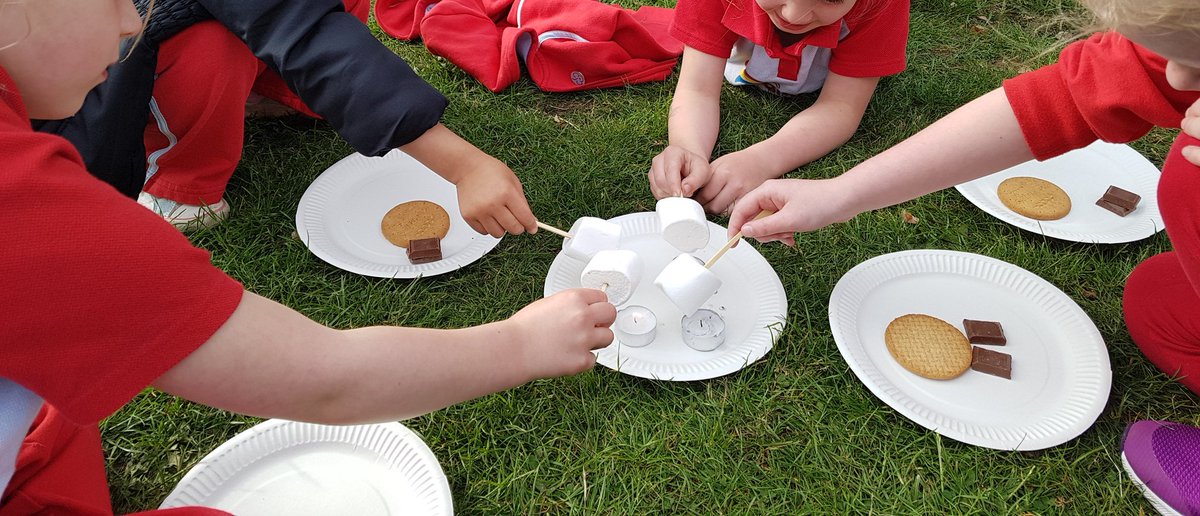 202A Monday Rainbows toasted marshmallows to make s'mores and said goodbye to 14 Rainbows on our last meeting!