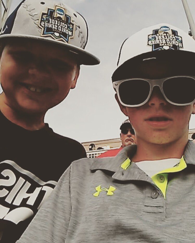 lyndseygrigby's tweet photo. From #omaha these cool cats are currently watching Texas and Arkansas living a little boys dream at #CWS18 #OMADAWGS #HailStateBB #notmissingathing https://t.co/W2Ol6l1CXn
