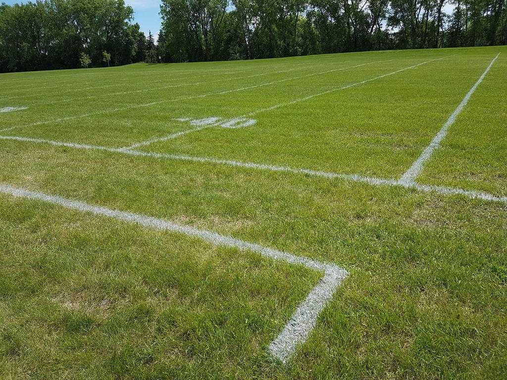 PITFOOTBALL's tweet photo. No rest for the wicked...@ApexLining gets River Elm up and running for this weeks games.  Best field liners in the province providing our teams the #BestGameDayExperience! https://t.co/cT1K6r9ysG