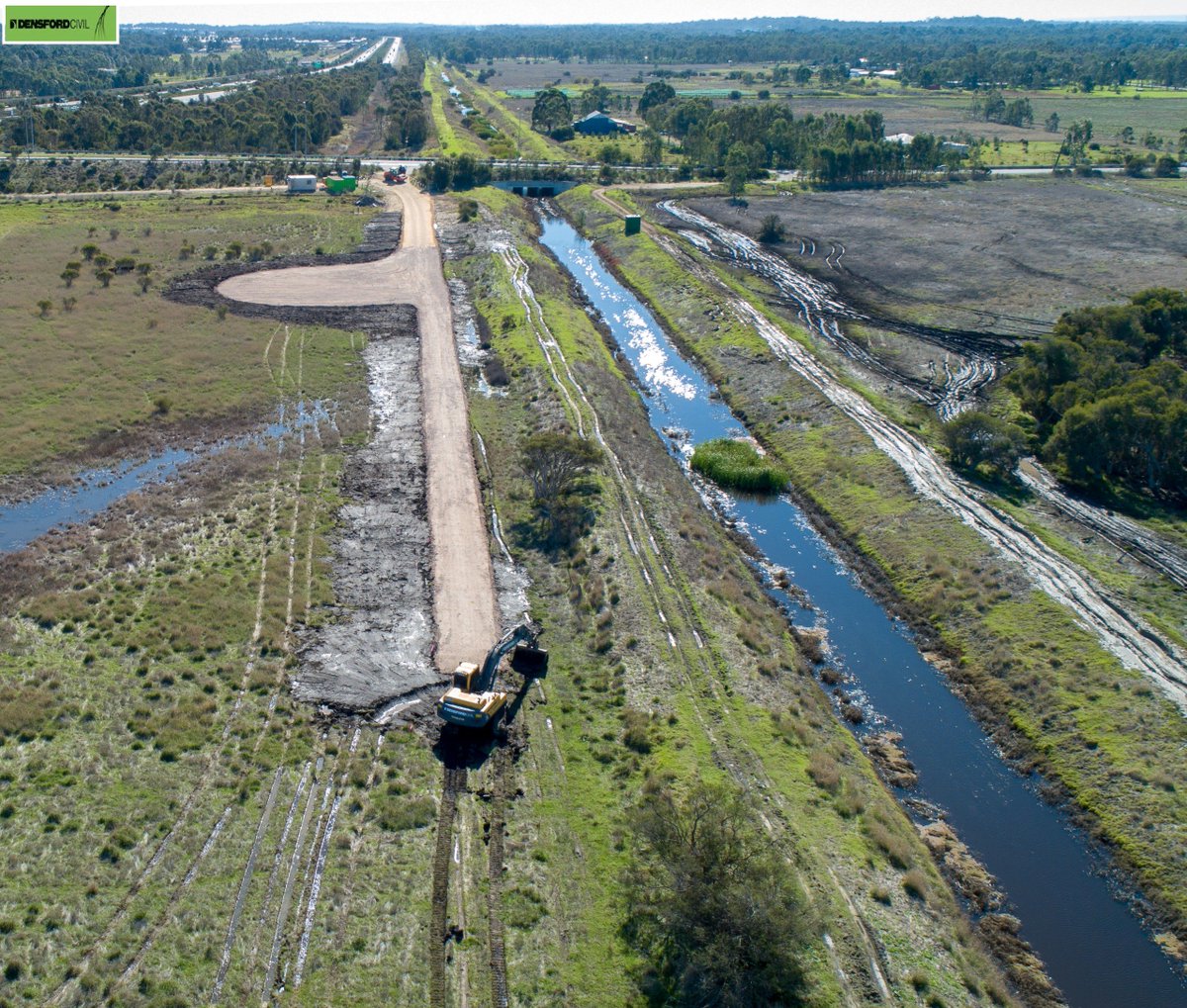 NeilDDixon's tweet photo. Despite June being decidedly wet for a (nice) change, construction of the #REIPeel Main Drain water treatment project access road forges ahead. 250m in the first week - only 600m to go! Thanks again to our partners @DWER_WA and @watercorpwa for helping #WAestuaries https://t.co/wxqzTpj4yc