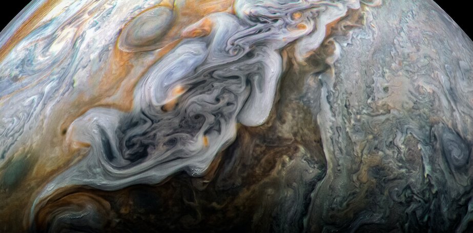 NASA's tweet photo. The magnificent Jupiter. Since 2016, @NASAJuno spacecraft has been gracing us with beautiful images of the giant gas planet's chaotic vortices and penetrating its deep, colorful zones and belts in a quest to reveal its origin story: https://t.co/JvlDJpZ7Ks https://t.co/5592rmjJCv