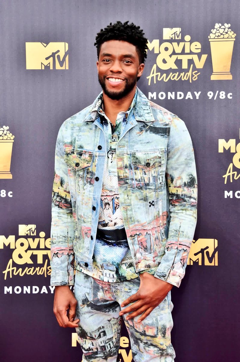 chadwickboseman's tweet photo. Felt good to hit the #MTVAwards red carpet with the #BlackPanther crew yesterday. Check out the show tomorrow to see who takes home the popcorn this year. https://t.co/9J0Pq9XD2K