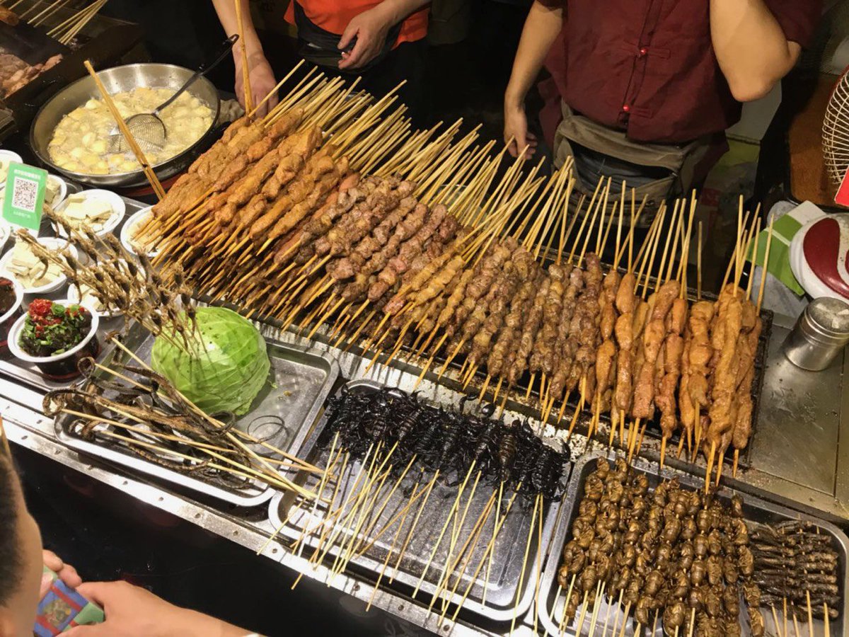 LacyESLions's tweet photo. We made it! 14hr flight from DC to Beijing. Went out last night with a small group to an open air market and enjoyed noodles and dumplings. Watched some adventurous friends try fried seahorse, starfish, and even scorpion! #LacyChina2018 @GoGlobalNC #globalteachers @BusickLacy https://t.co/5EblUMc5rS