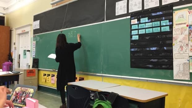 cbcnewsbc's tweet photo. The first of group of students to ever entirely complete Vancouver's only Mandarin immersion program is set to graduate at the end of June. https://t.co/QjVkx3Ff1R https://t.co/0aZ3W86rvF