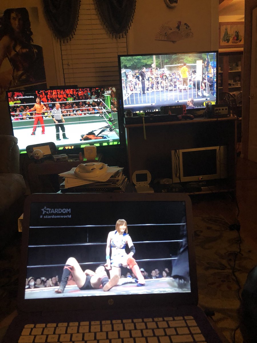 OhioCatLady's tweet photo. How I normally catch up on my wrestling lmao! #IcanMultitask https://t.co/J7uZHnLj5R