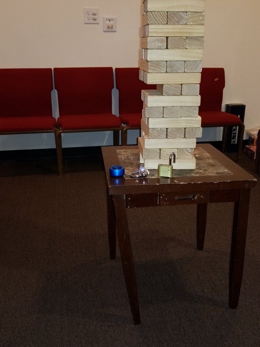 EscapeSpokane's tweet photo. You know we have to add a twist to even your favorite games. For instance, we had this table specially made with a rickety leg and imported from a top secret shop in Siberia to really ramp up your Jenga experience. https://t.co/YIOZekvUMB