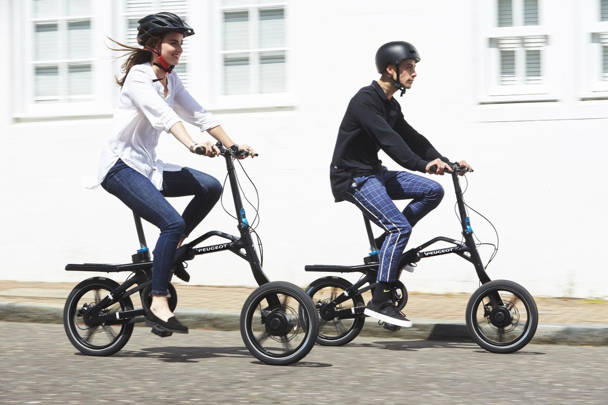 ClassicanaUK's tweet image. Peugeot's electric bicycle, the eF01 (range 18-25 miles) is now on sale in the UK. No price given as yet. According the #Peugeot it integrates into the boot space of the all-new 5008 SUV, again they don't say how. We think they mean it fits in the back! #bicycles #sustainability