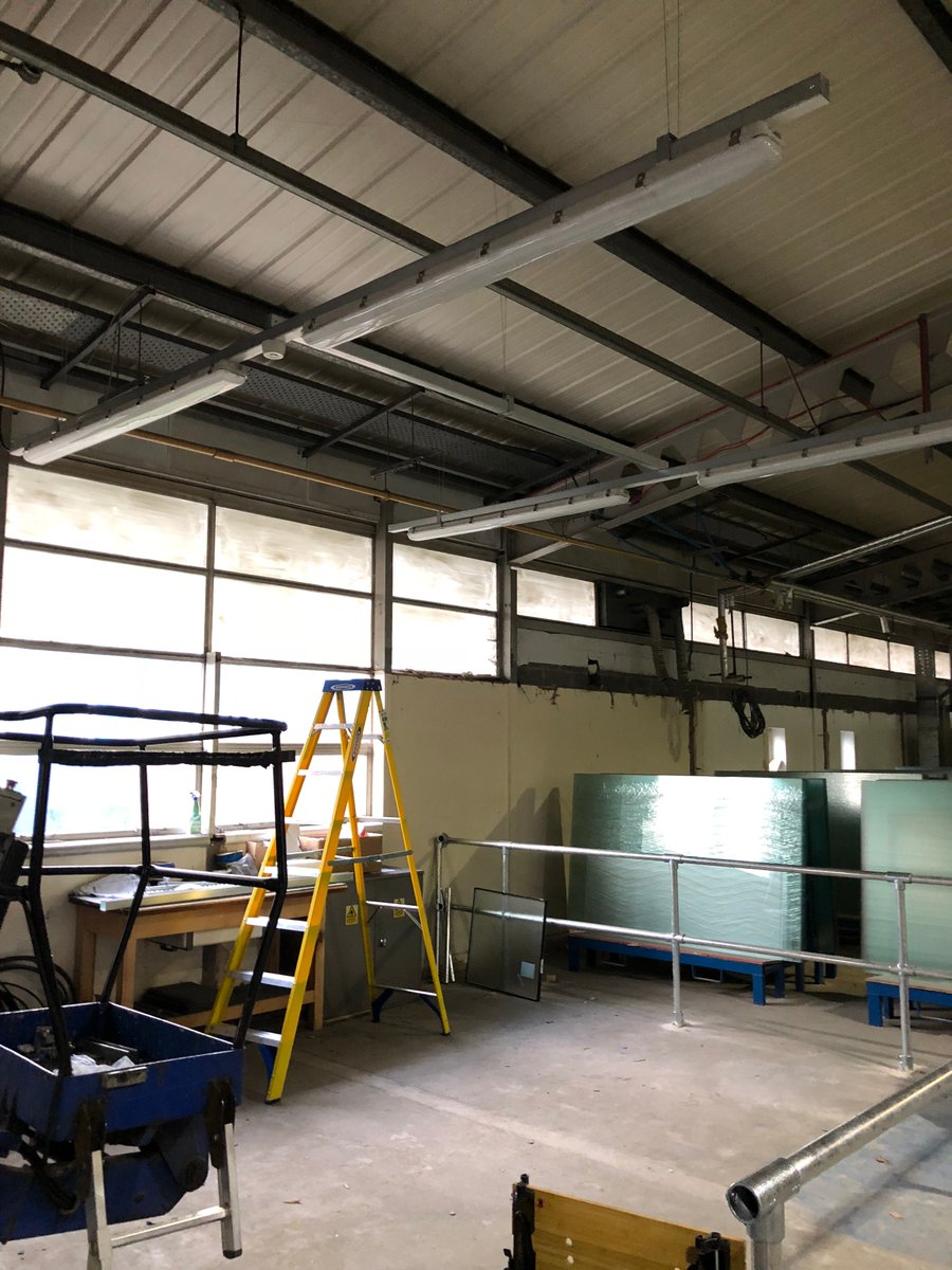 Installation progress pictures of lighting and power to a quality control area on an industrial premises.  LED Lighting ensuring energy efficiency and metal containment to prevent mechanical damage to conductors to comply with regulations. #led #lighting #factory #chester