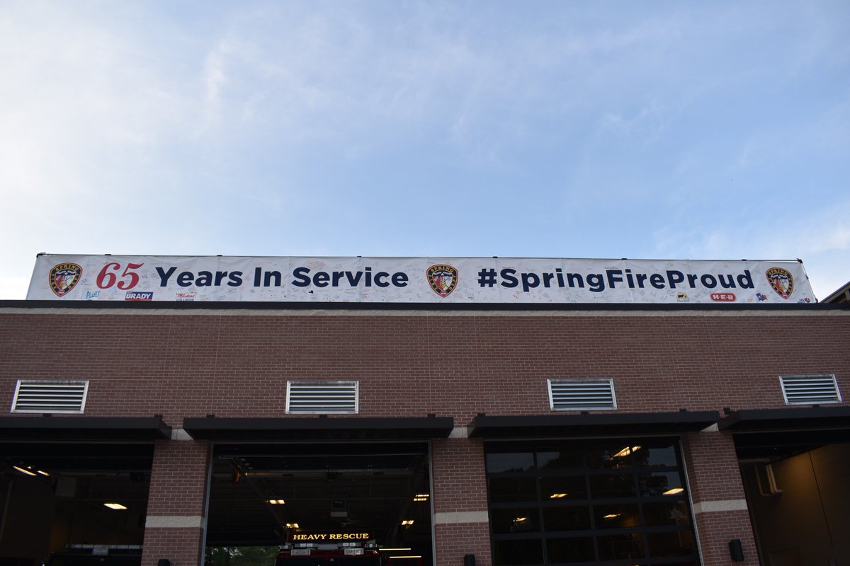 Springfdtx's tweet photo. The @Springfdtx is grateful every day for the support #SpringTX has shown us over our first #65YearsInService. Early today, our facilities crew and Station 71's crews worked together to hang a banner -- signed by many of you -- over Station 71's bays. #SpringFireProud https://t.co/HZ11w5UvHr