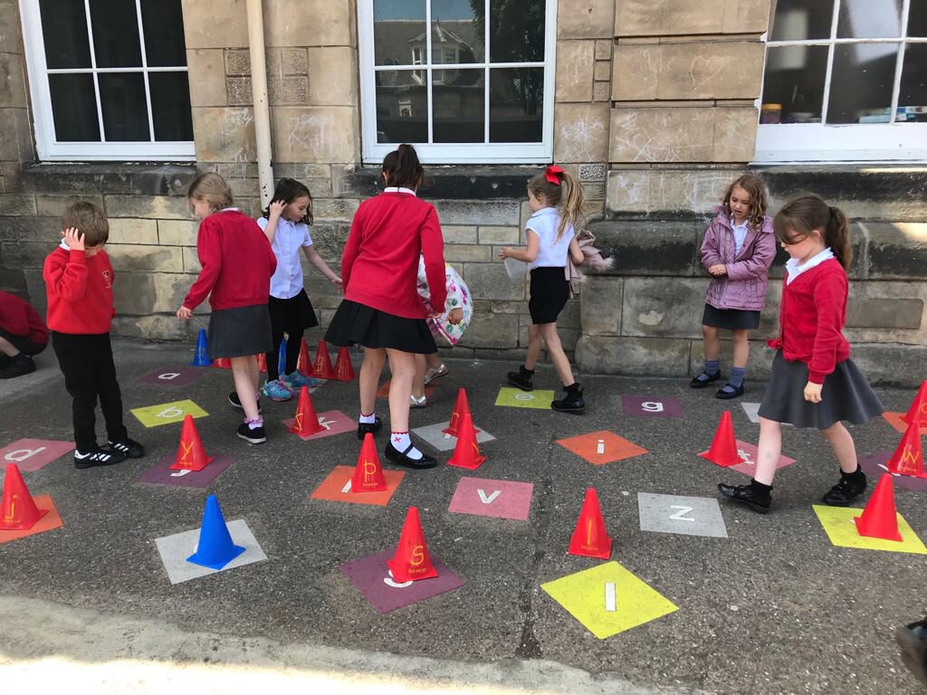 AyrGrammar's tweet photo. Fun with words and letters in the playground at lunchtime #findingsomeshade #FindingTheWords #LetterMatch #vowels #uppercase #lowercase https://t.co/3tDxbnBcIc