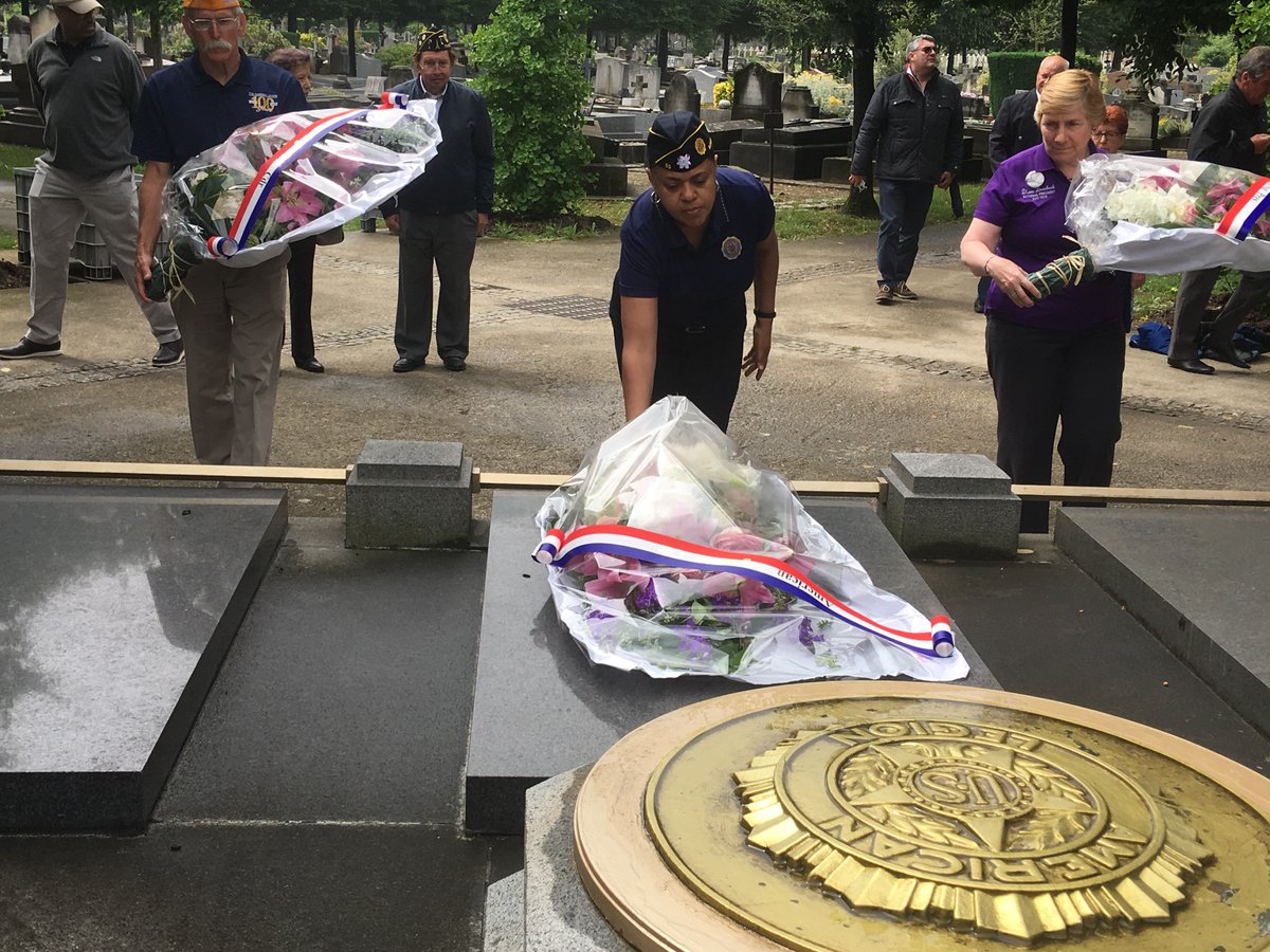 American Legion Chief of Staff Verna Jones, flanked by Sons of The American Legion Nat’l  Commander Danny Smith and <a href="/ALAforVeterans/">ALA National HQ</a> Nat’l President Diane Duscheck, places flowers at the 81-year-old Paris Post 1 Mausoleum in France. Nearly 300 U.S. veterans are entombed there.
