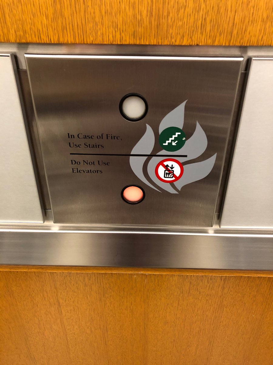 weisesarah's tweet photo. What odd placement of "in case of fire" messaging. Made me think I was doing something wrong by pressing the button! #uxbrain #cantturnitoff https://t.co/FZmJqWx36J