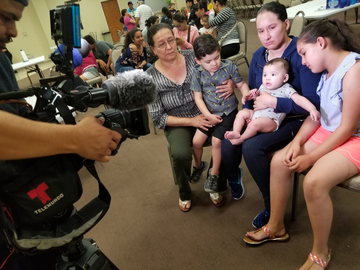 VeroDahlberg's tweet photo. HOLA sorting through the devastation, supporting families, after Ohio immigration raid. Heavily-armed agents with canines and AR-15s seized 114 Ohio farmworkers at a nursery where they plant flowers. CALL OHIO LAWMAKERS NOW! https://t.co/eLMOmjjld1