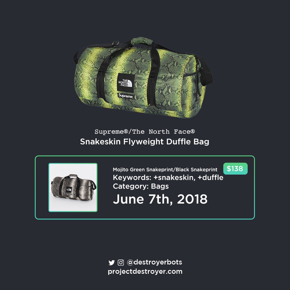 supreme north face snakeskin duffle bag